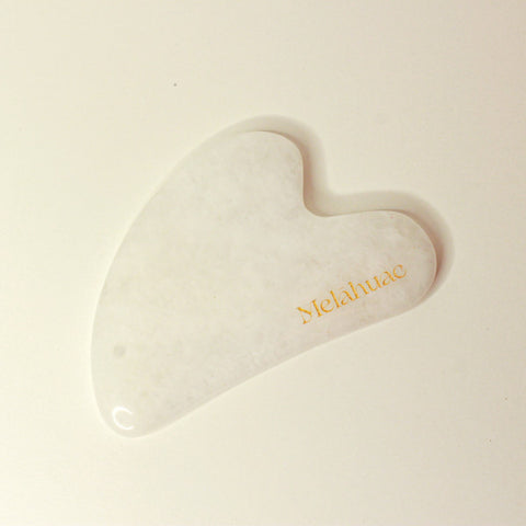 Gua sha en quartz blanc