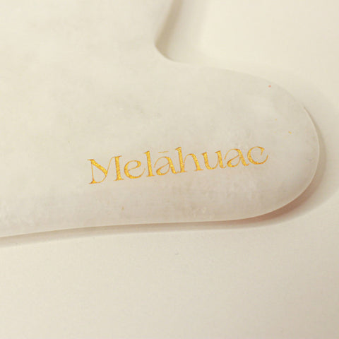 Gua sha en quartz blanc