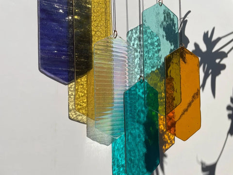 Mobile mit geometrischem Glas