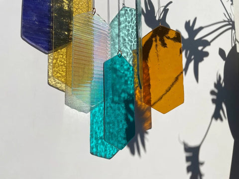 Mobile mit geometrischem Glas