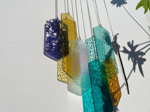 Mobile mit geometrischem Glas