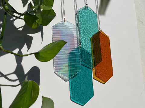 Mobile mit geometrischem Glas