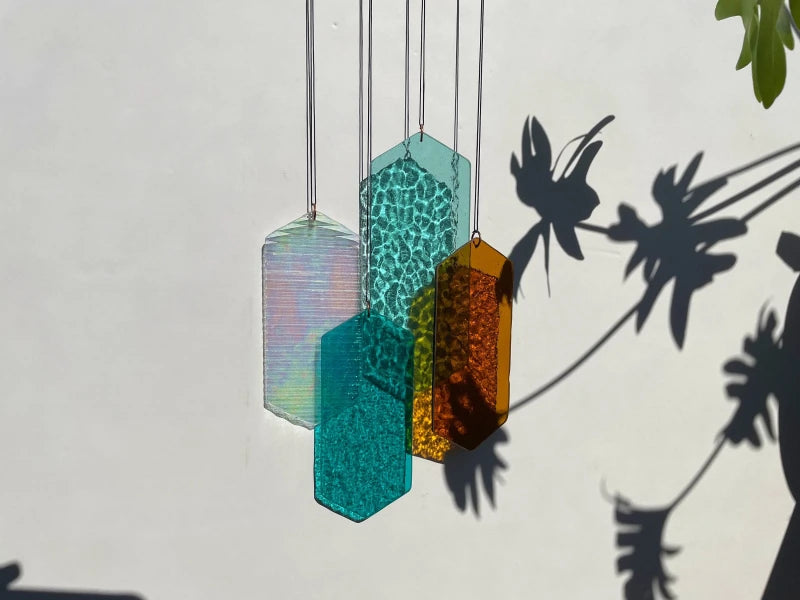 Mobile mit geometrischem Glas