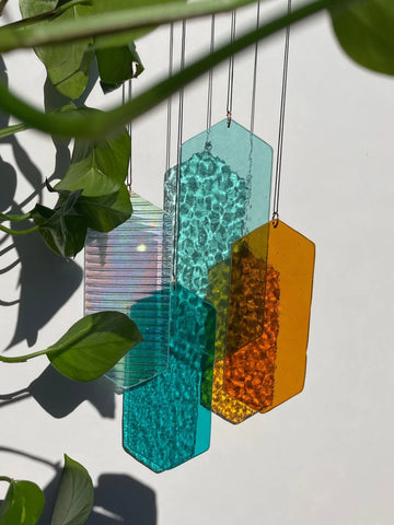 Mobile mit geometrischem Glas