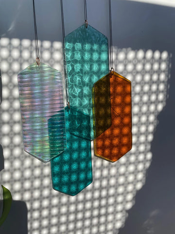 Mobile mit geometrischem Glas