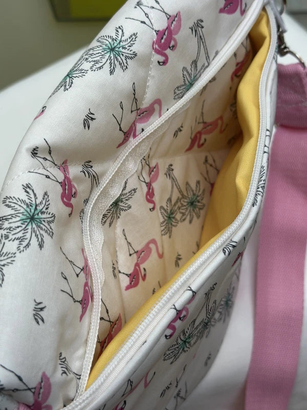 Sac banane blanc motifs flamants roses