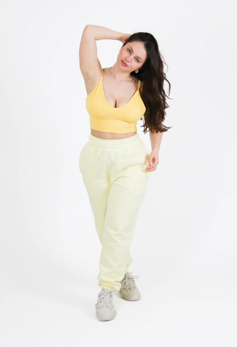 Jogging Néphélée jaune avec logo Aphaïa
