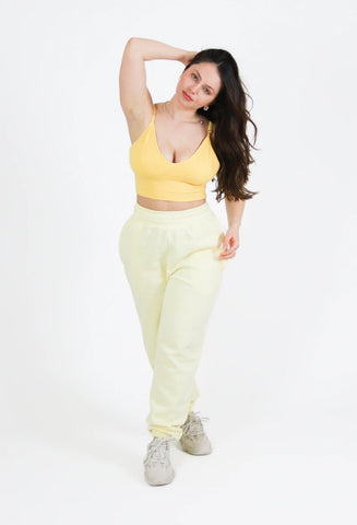 Jogging Néphélée jaune avec logo Aphaïa