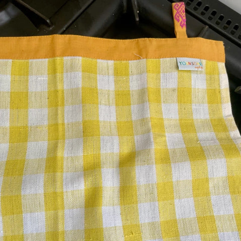 Torchon de cuisine jaune à carreaux
