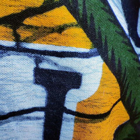 Couverture éco-responsable verte en tissu wax avec motif alphabet